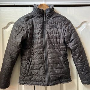 North face girls reversible jacket. Black.  Size 10-12.